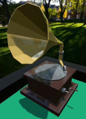 By the corner of the table is a large, metallic gramophone.